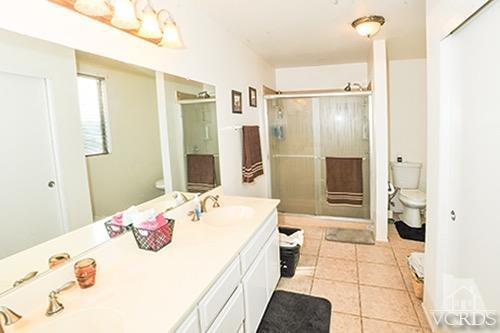 3636 Olds Road Oxnard, CA 93033 - Photo 23 of 23 a bathroom with a tub sink and shower