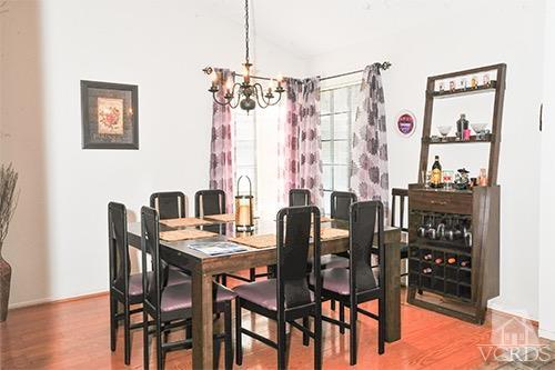 3636 Olds Road Oxnard, CA 93033 - Photo 4 of 23 a view of a dining room with furniture and wooden floor