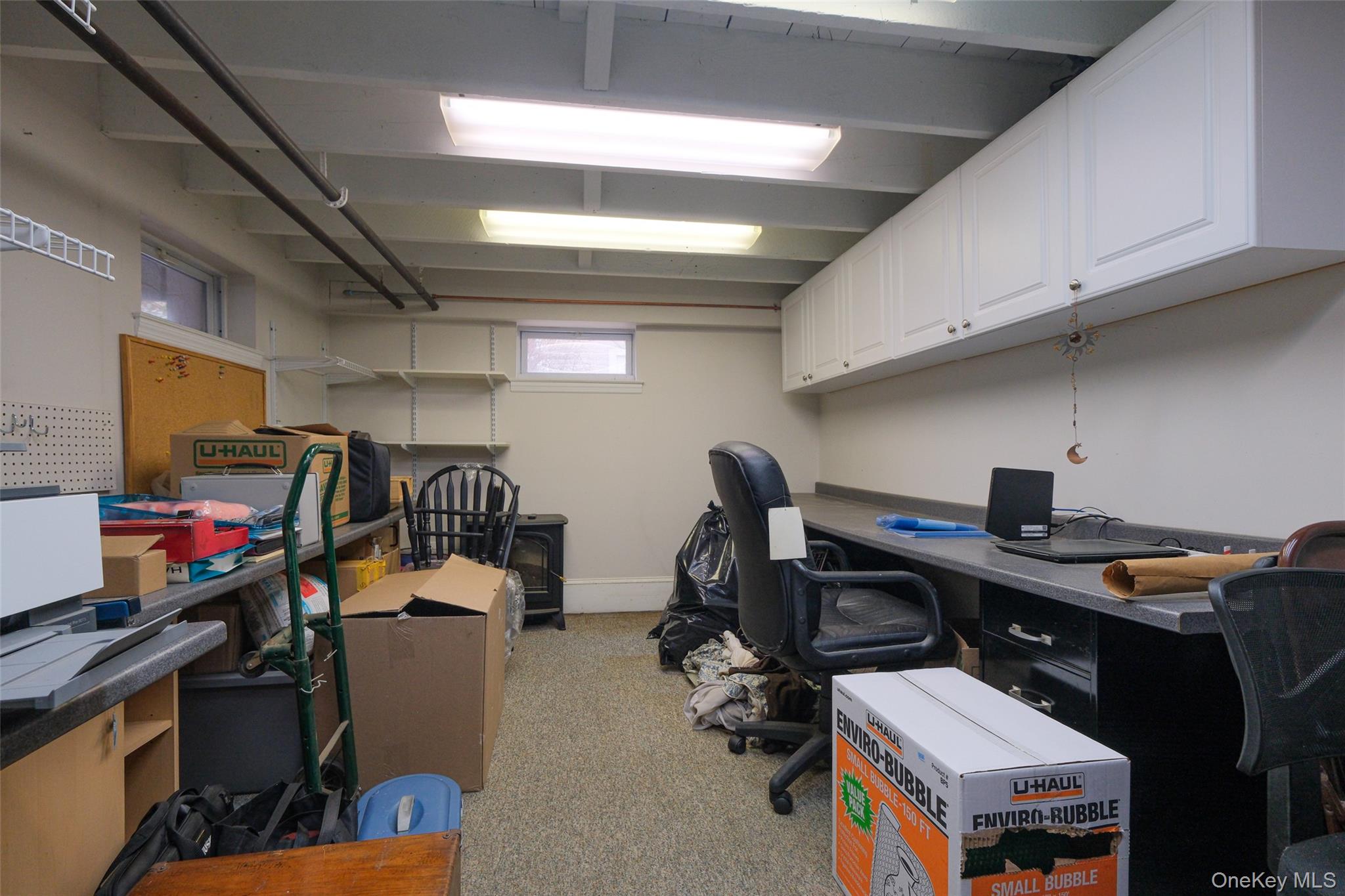 1611 Hyatt Avenue Peekskill, NY 10566 - Photo 16 of 25 a view of a workspace with furniture