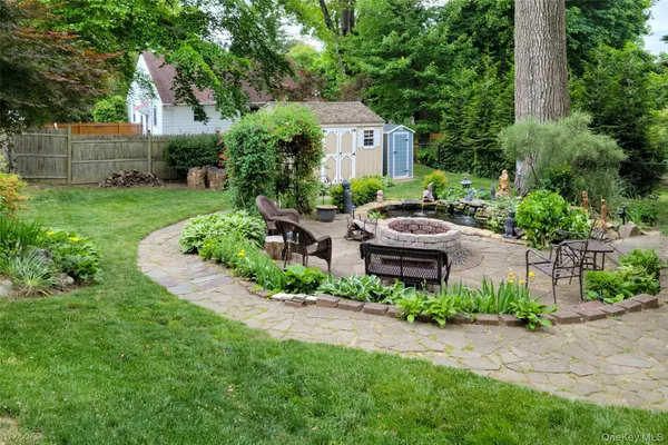 a garden view with a seating space