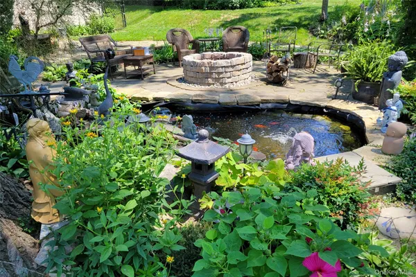 a view of swimming pool with a yard