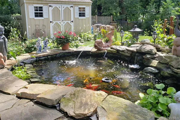 a view of a lake with a yard