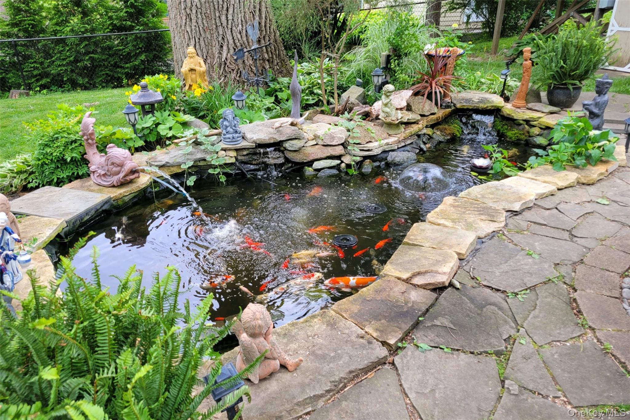 1611 Hyatt Avenue Peekskill, NY 10566 - Photo 22 of 25 a view of a lake with a yard