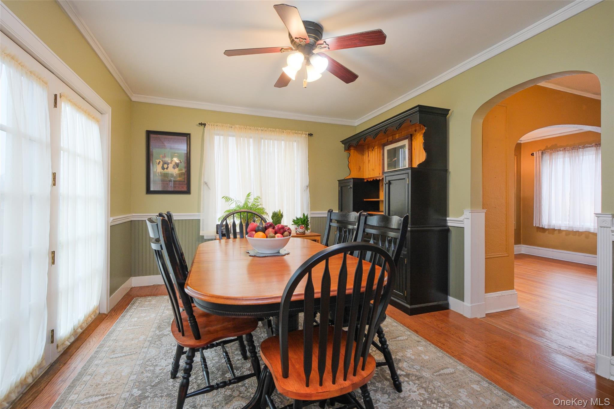 1611 Hyatt Avenue Peekskill, NY 10566 - Photo 6 of 25 a view of a dining room with furniture and wooden floor