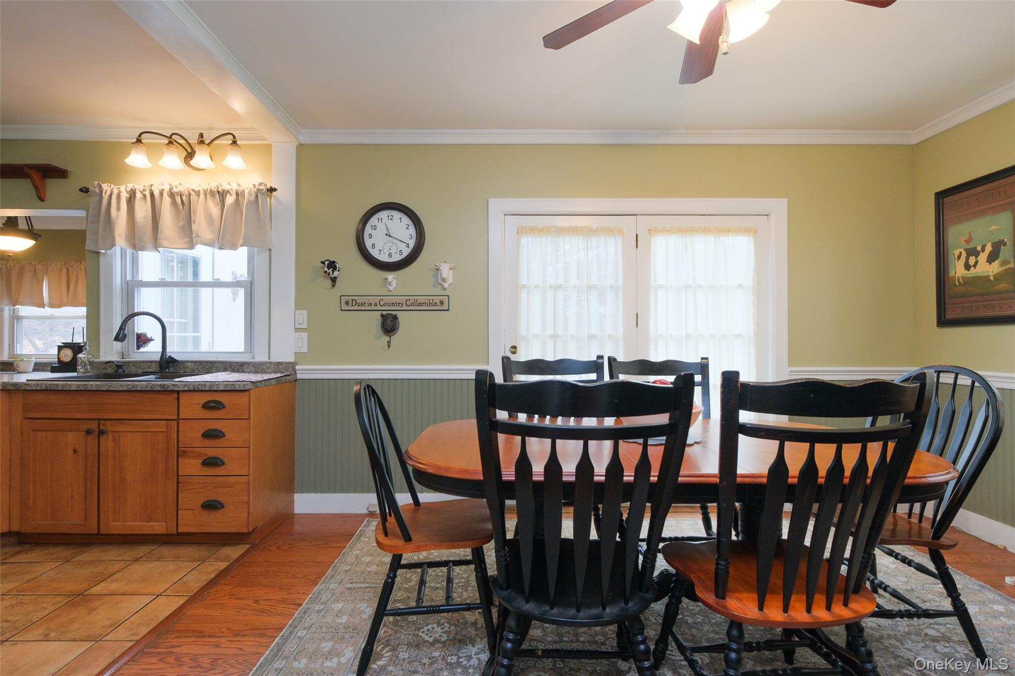 1611 Hyatt Avenue Peekskill, NY 10566 - Photo 7 of 25 a view of a dining room with furniture and chandelier