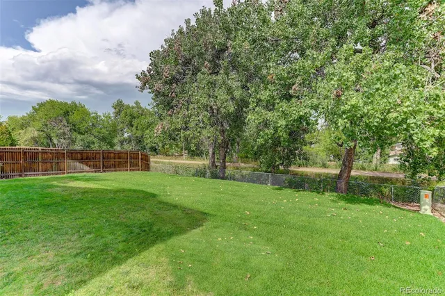 a view of a backyard with a garden
