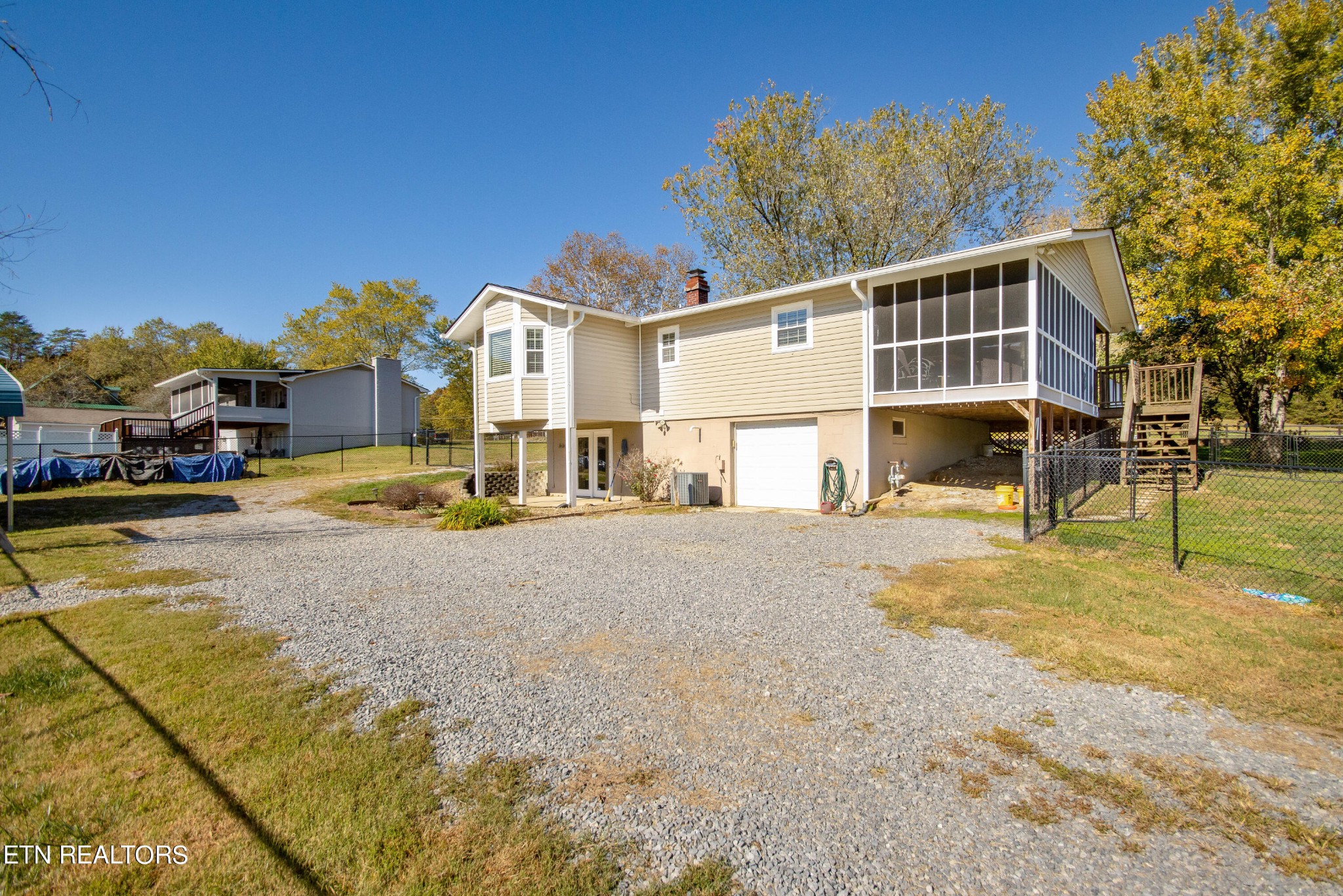 488 Raccoon Valley Road Powell, TN 37849 - Photo 18 of 24 a front view of a house with a yard