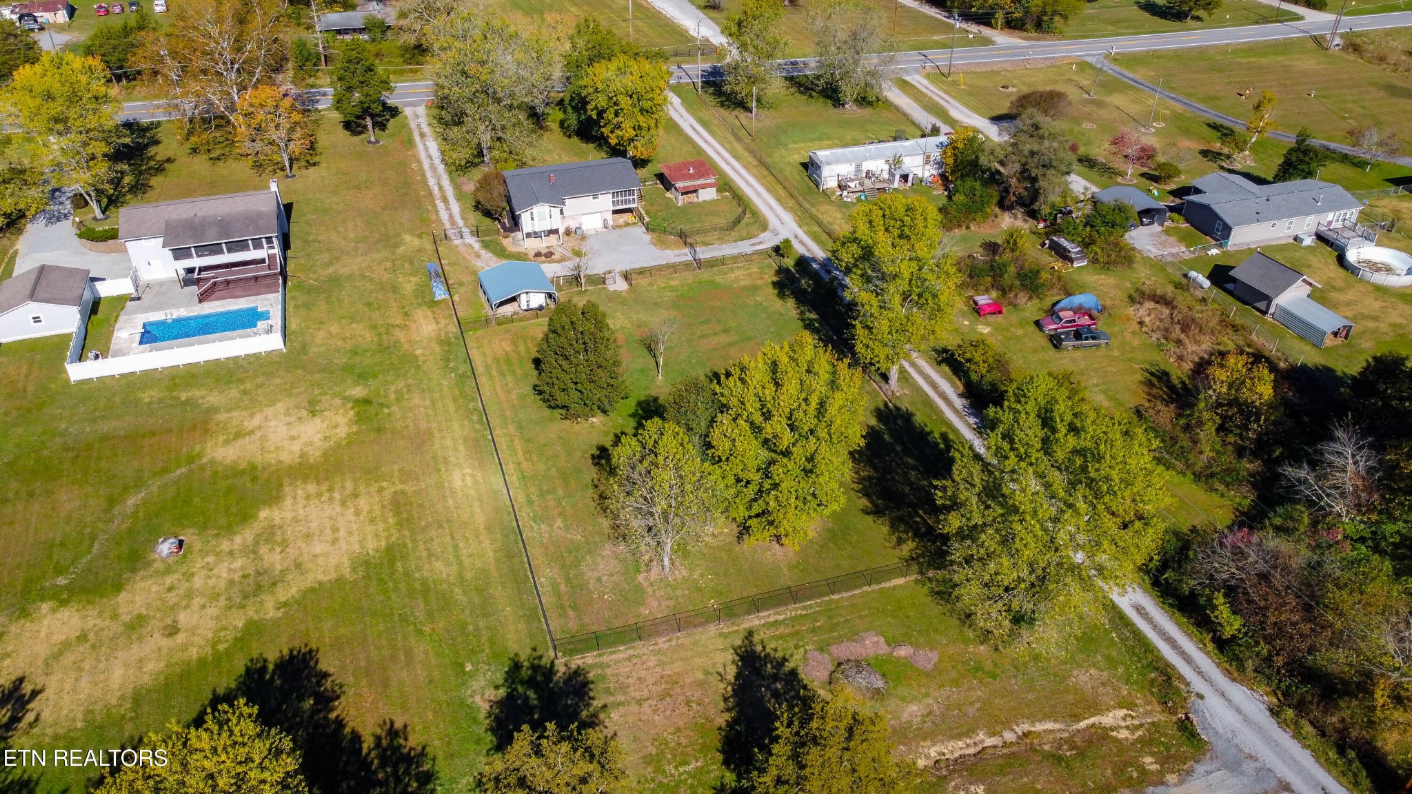 488 Raccoon Valley Road Powell, TN 37849 - Photo 23 of 24 an aerial view of residential houses with swimming pool