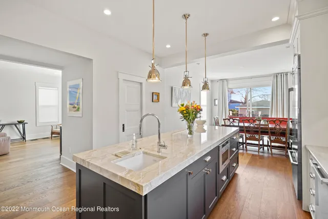 a very nice looking dining room with a table and chairs