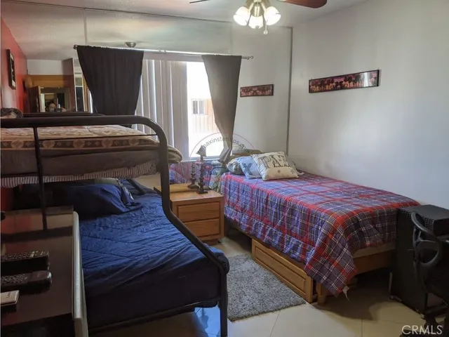 a terrace with a table and chairs