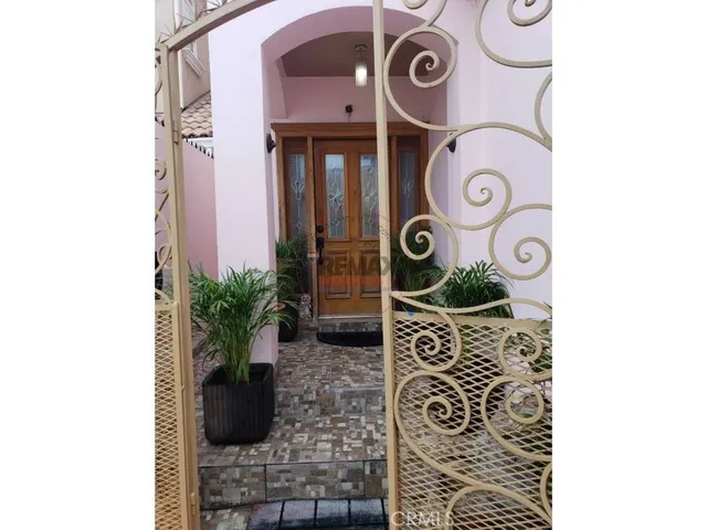 a view of door with wooden wall