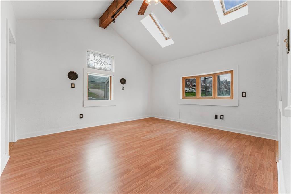 534 Magazine Street Carnegie, PA 15106 - Photo 5 of 11 a view of a big room with wooden floor and windows