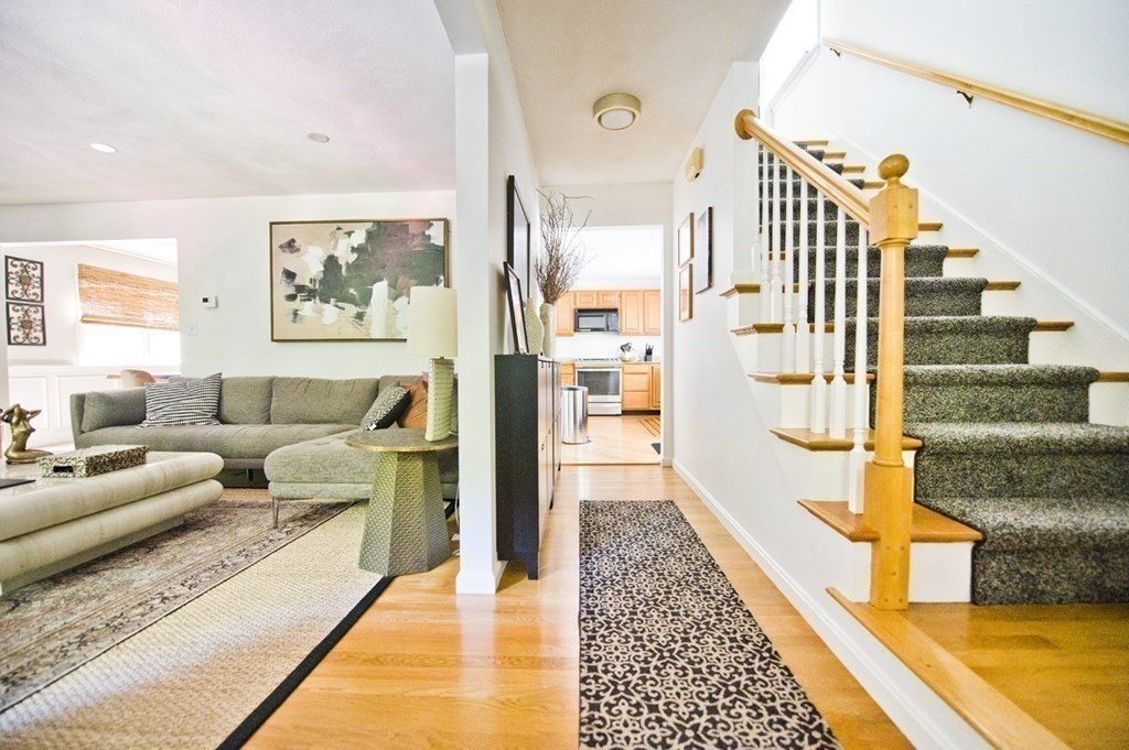 16 Warren Avenue Newton, MA 02465 - Photo 33 of 42 a living room with furniture and a rug