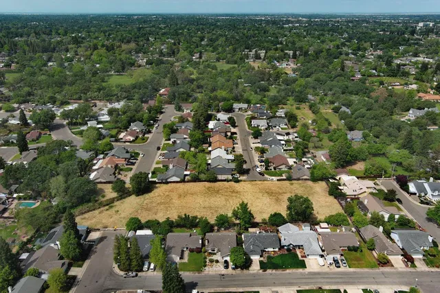 an aerial view of a city with lots of residential buildings