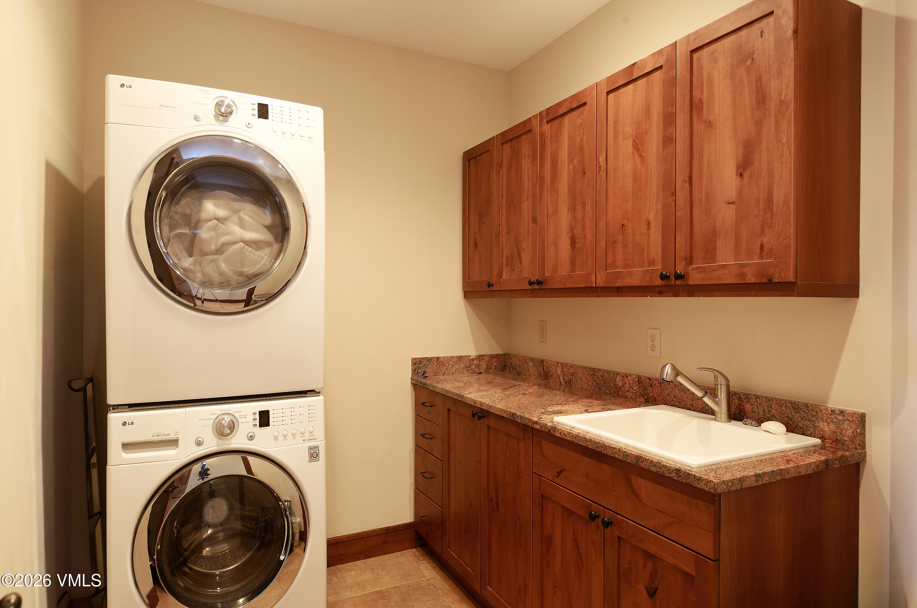 2753 East Haystacker Drive Eagle, CO 81631 - Photo 38 of 41 a utility room with sink dryer and washer