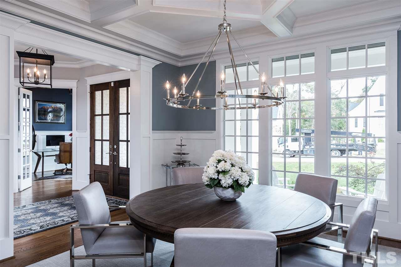 5417 Winding View Lane Raleigh, NC 27615 - Photo 11 of 30 Dining room with a glimpse of the foyer and downstairs office.