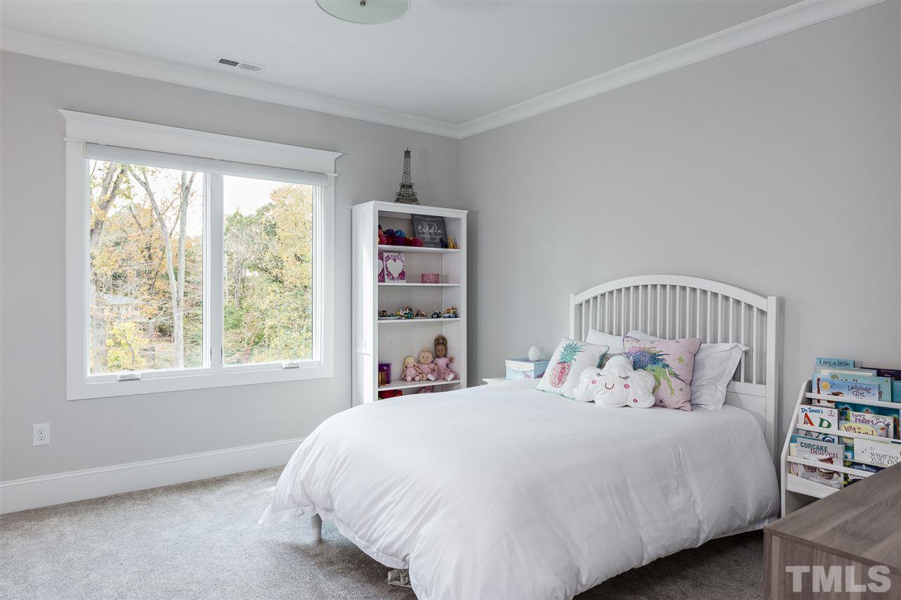 5417 Winding View Lane Raleigh, NC 27615 - Photo 23 of 30 This is the second bedroom that shares the Jack-and-Jill bath.