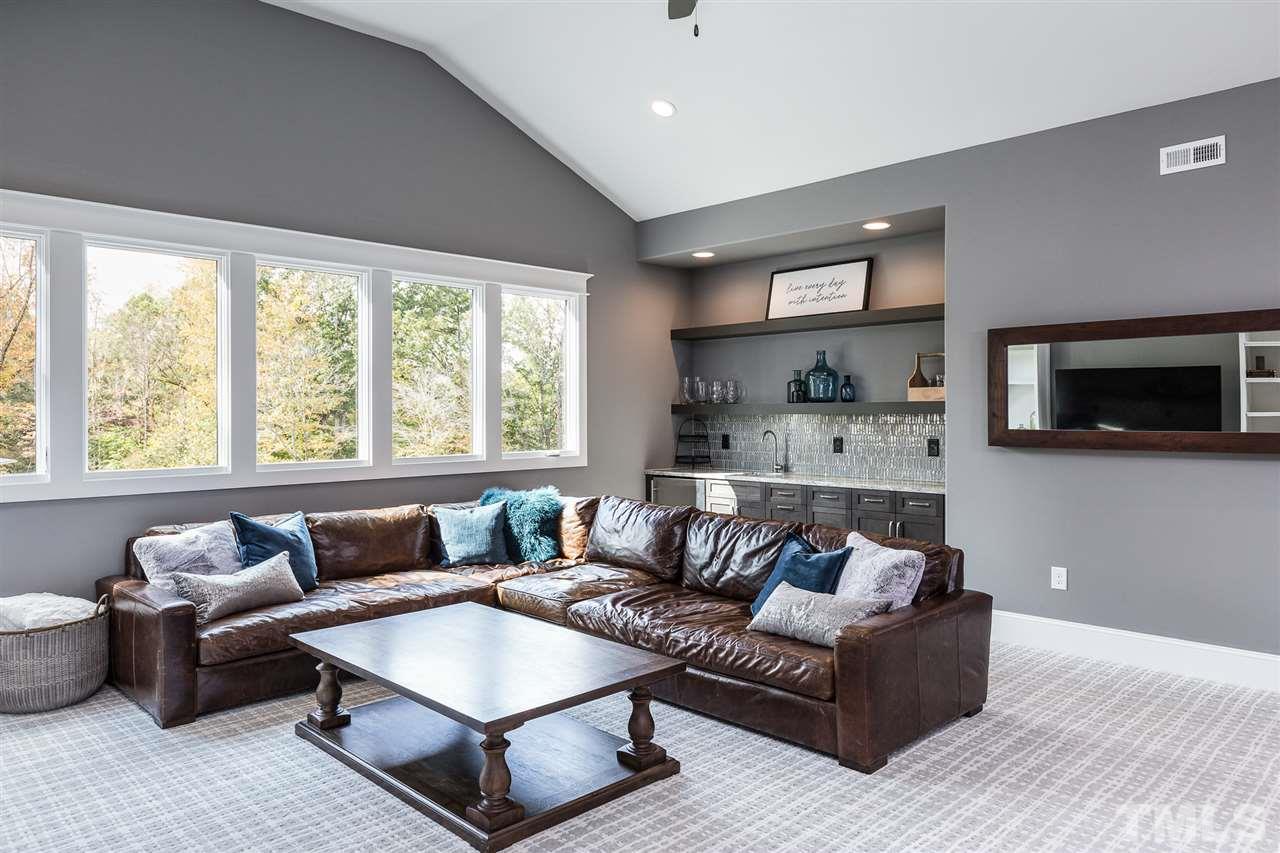 5417 Winding View Lane Raleigh, NC 27615 - Photo 25 of 30 This large bonus room features a cathedral ceiling, wet bar, and walk-in attic storage.