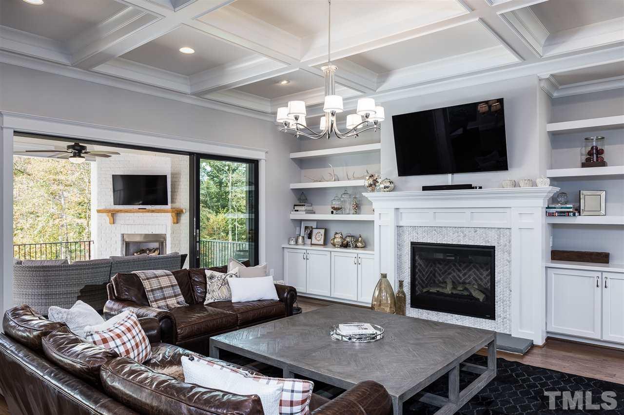 5417 Winding View Lane Raleigh, NC 27615 - Photo 6 of 30 Large open great room leads to the veranda with multi-sliding glass patio doors to let the outdoors in.