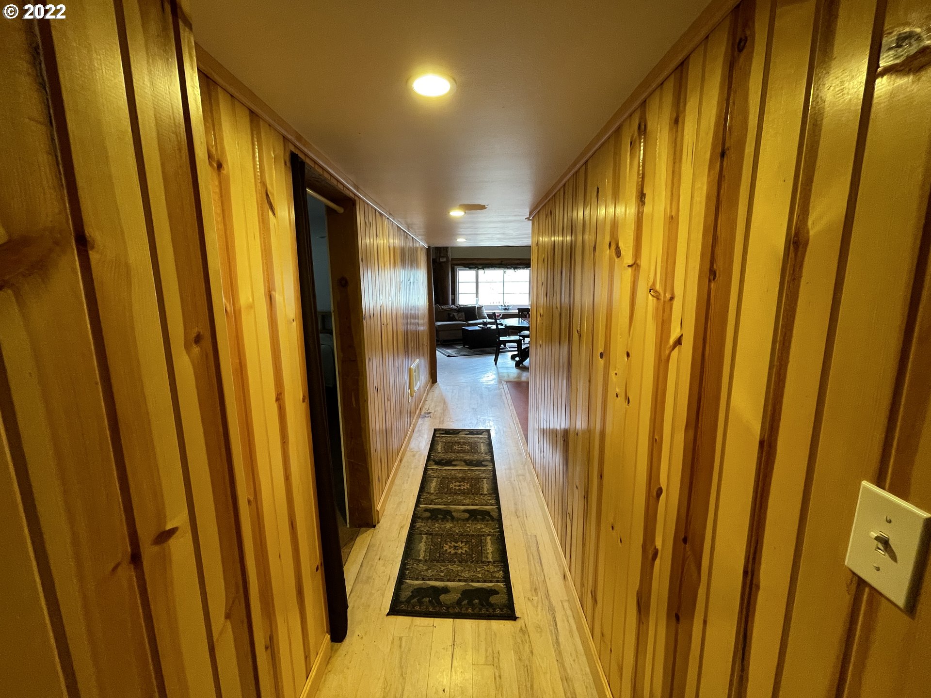 81 Soda Springs Road Goldendale, WA 98620 - Photo 23 of 31 a view of a hallway with wooden floor and stairs