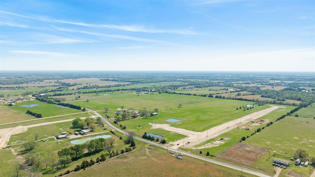 234 Private Road Roxton, TX 75477 - Photo 3 of 12 an aerial view of a city