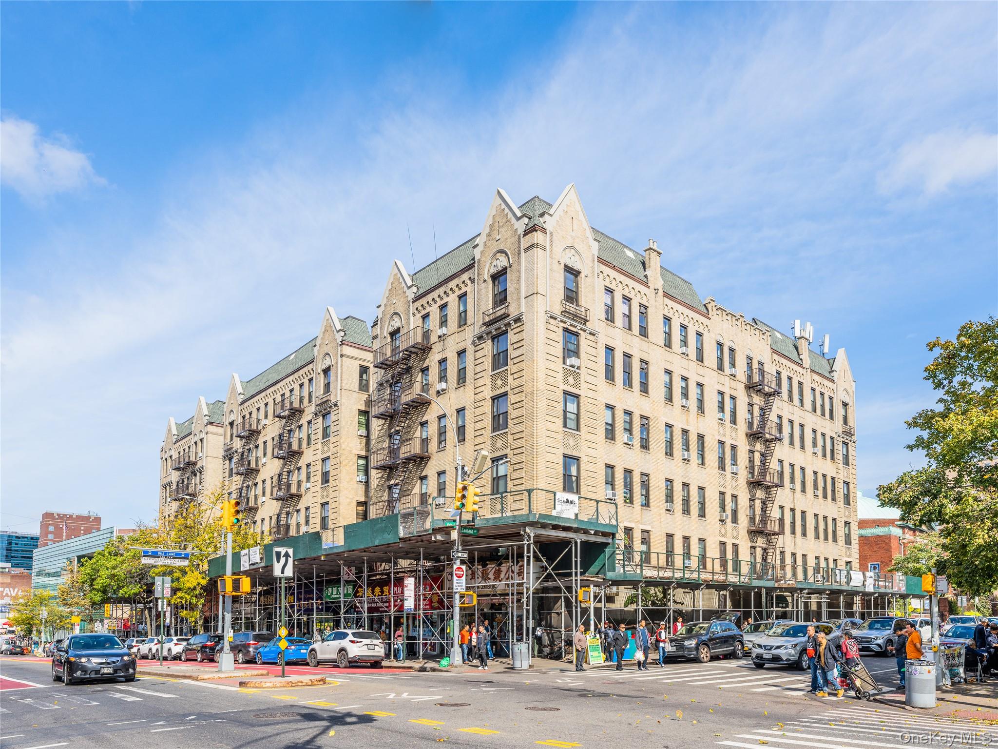 136-05 Sanford Avenue, Unit 6S Queens, NY 11355 - Photo 1 of 15 a view of a building and a street