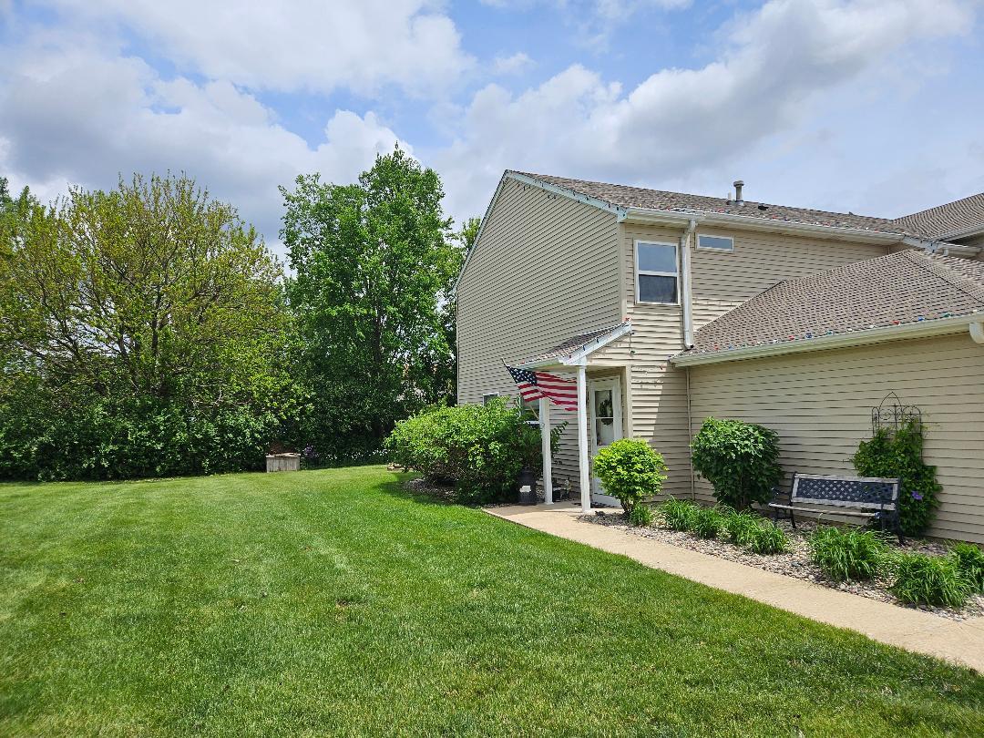 25159 Faraday Road Manhattan, IL 60442 - Photo 23 of 28 a front view of a house with a yard