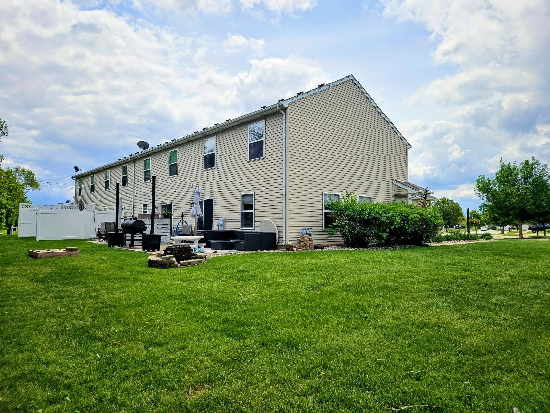 25159 Faraday Road Manhattan, IL 60442 - Photo 27 of 28 a view of a house with backyard sitting area and garden