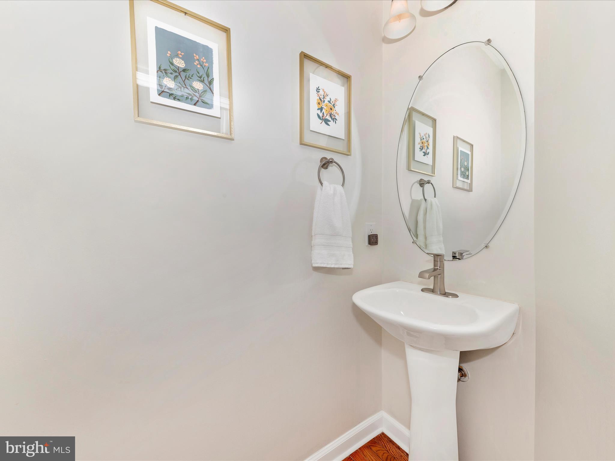 9034 Allington Manor Circle West Frederick, MD 21703 - Photo 14 of 55 a bathroom with a sink and a mirror