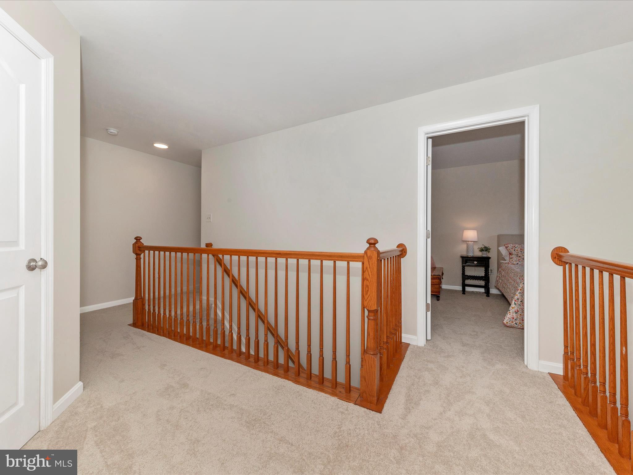 9034 Allington Manor Circle West Frederick, MD 21703 - Photo 16 of 55 a view of a hallway with closet and a livingroom view
