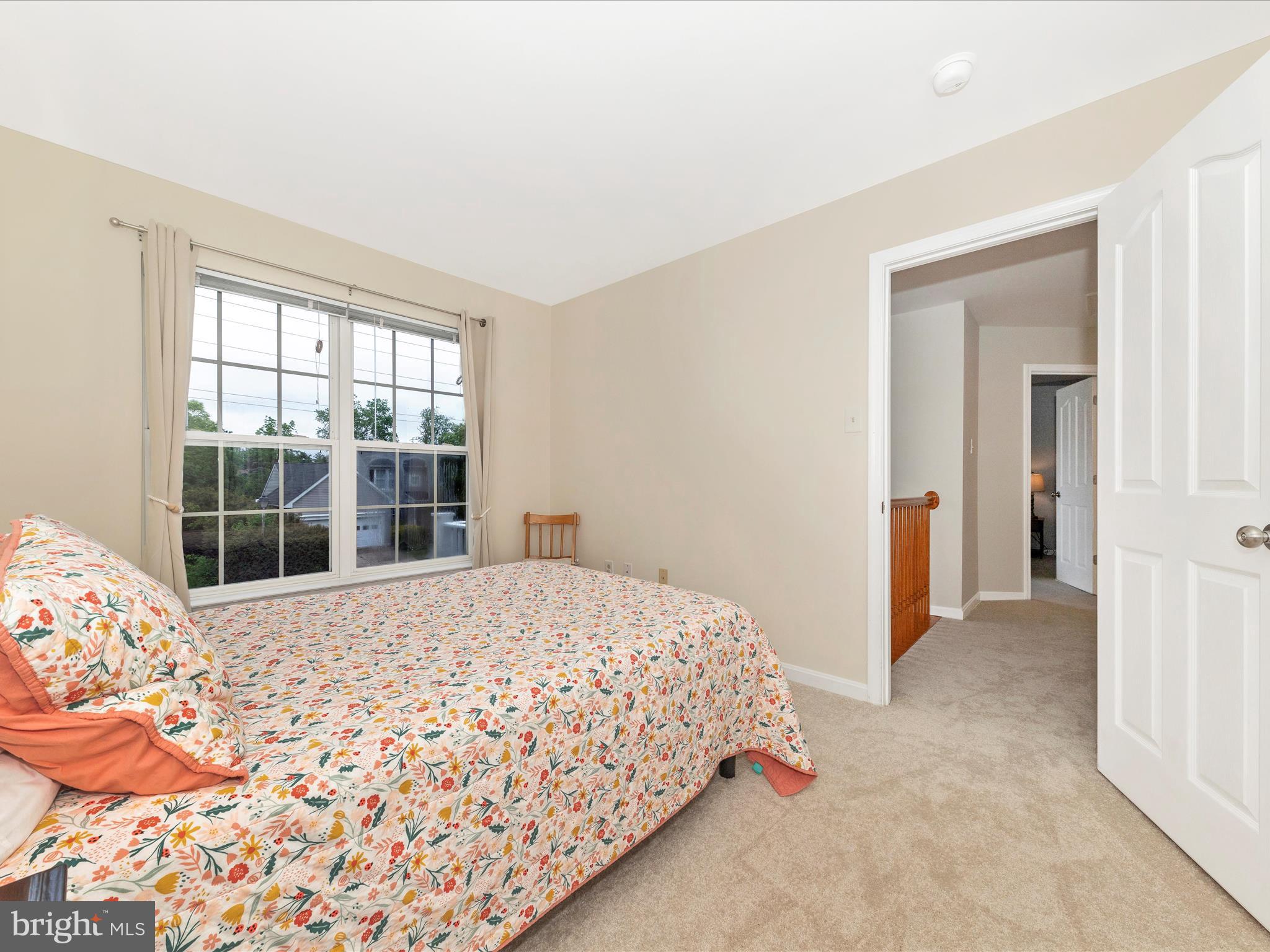 9034 Allington Manor Circle West Frederick, MD 21703 - Photo 29 of 55 a bedroom with a bed and a window