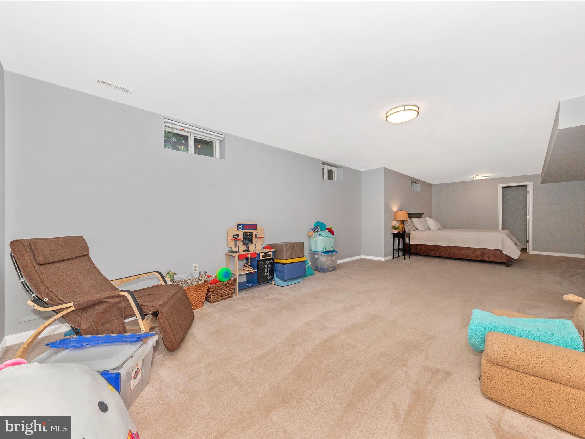 9034 Allington Manor Circle West Frederick, MD 21703 - Photo 33 of 55 a view of a storage & utility room with furniture and toys