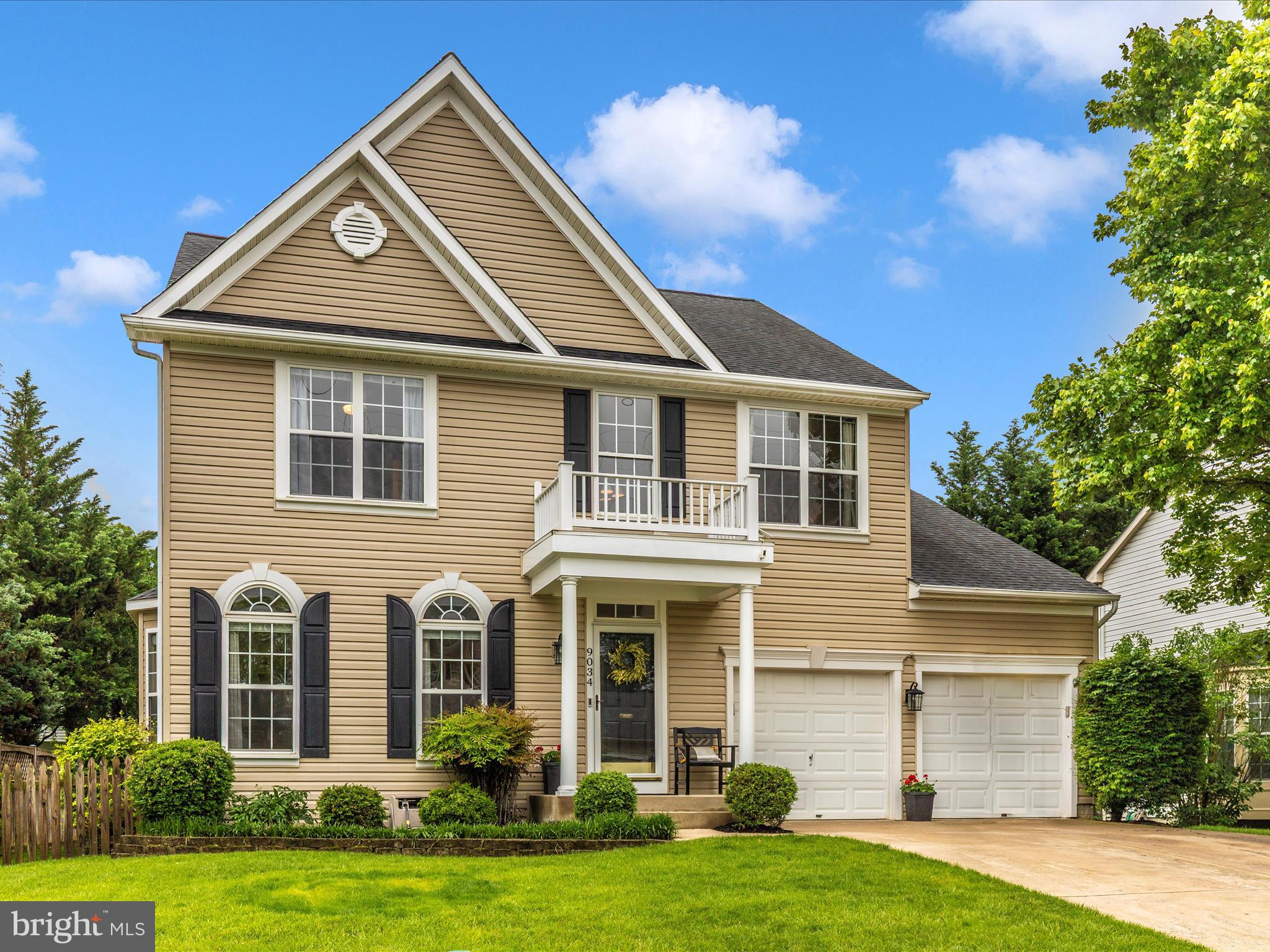 9034 Allington Manor Circle West Frederick, MD 21703 - Photo 38 of 55 a front view of a house with a yard