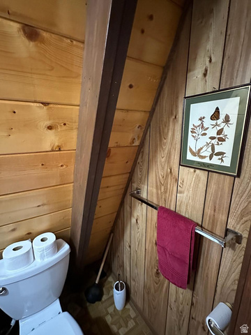 1456 Navajo Road Coalville, UT 84017 - Photo 34 of 55 Bathroom with wood walls and toilet