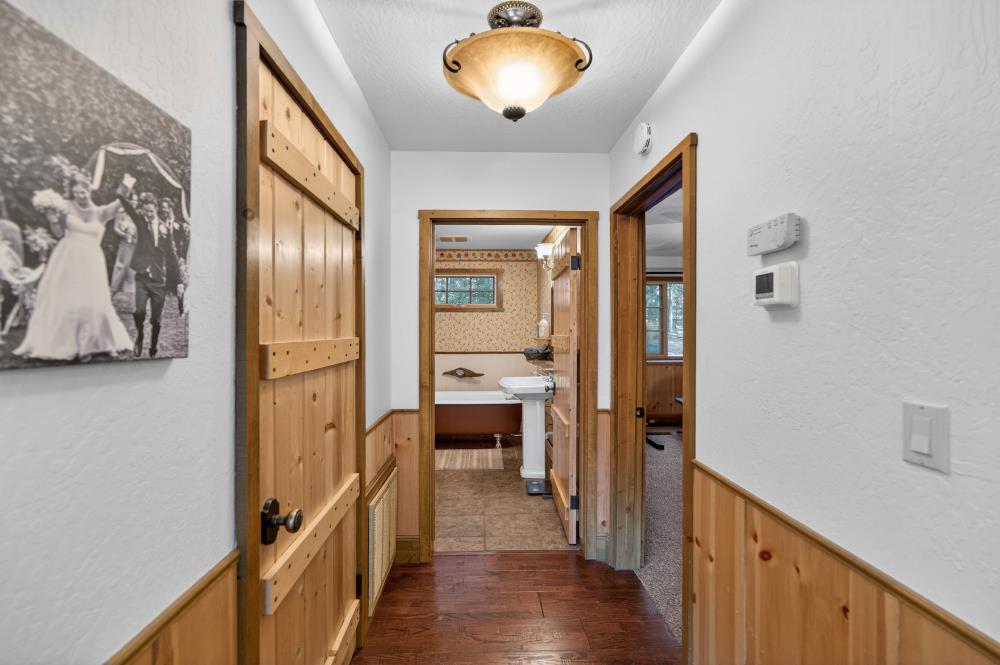 13052 Wood Rose Way Grass Valley, CA 95945 - Photo 19 of 46 a view of a hallway view with wooden floor and staircase