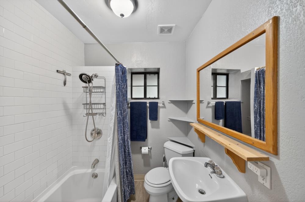 13052 Wood Rose Way Grass Valley, CA 95945 - Photo 37 of 46 a bathroom with a sink toilet and shower