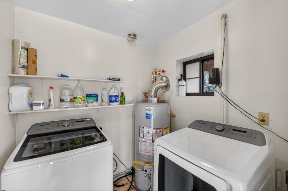 13052 Wood Rose Way Grass Valley, CA 95945 - Photo 38 of 46 a utility room with dryer and washer