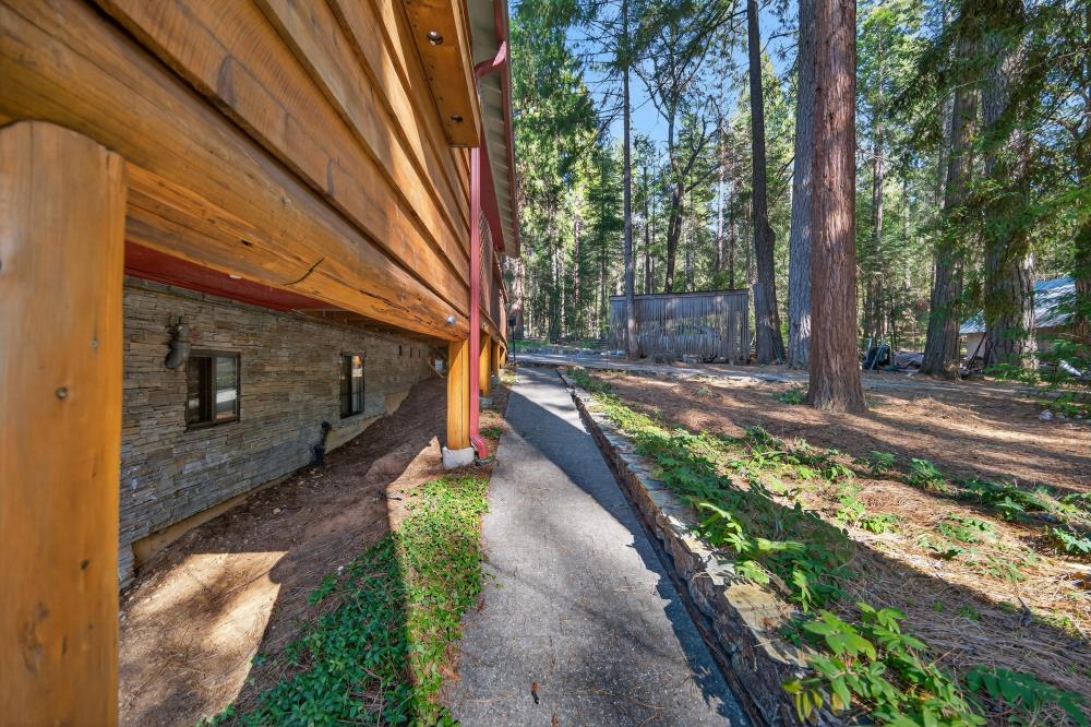 13052 Wood Rose Way Grass Valley, CA 95945 - Photo 39 of 46 a view of a pathway of a house with a yard