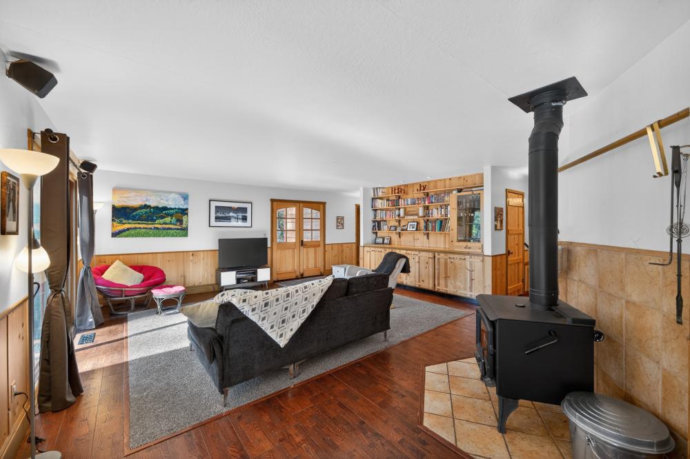13052 Wood Rose Way Grass Valley, CA 95945 - Photo 5 of 46 a living room with furniture window and a wooden floor