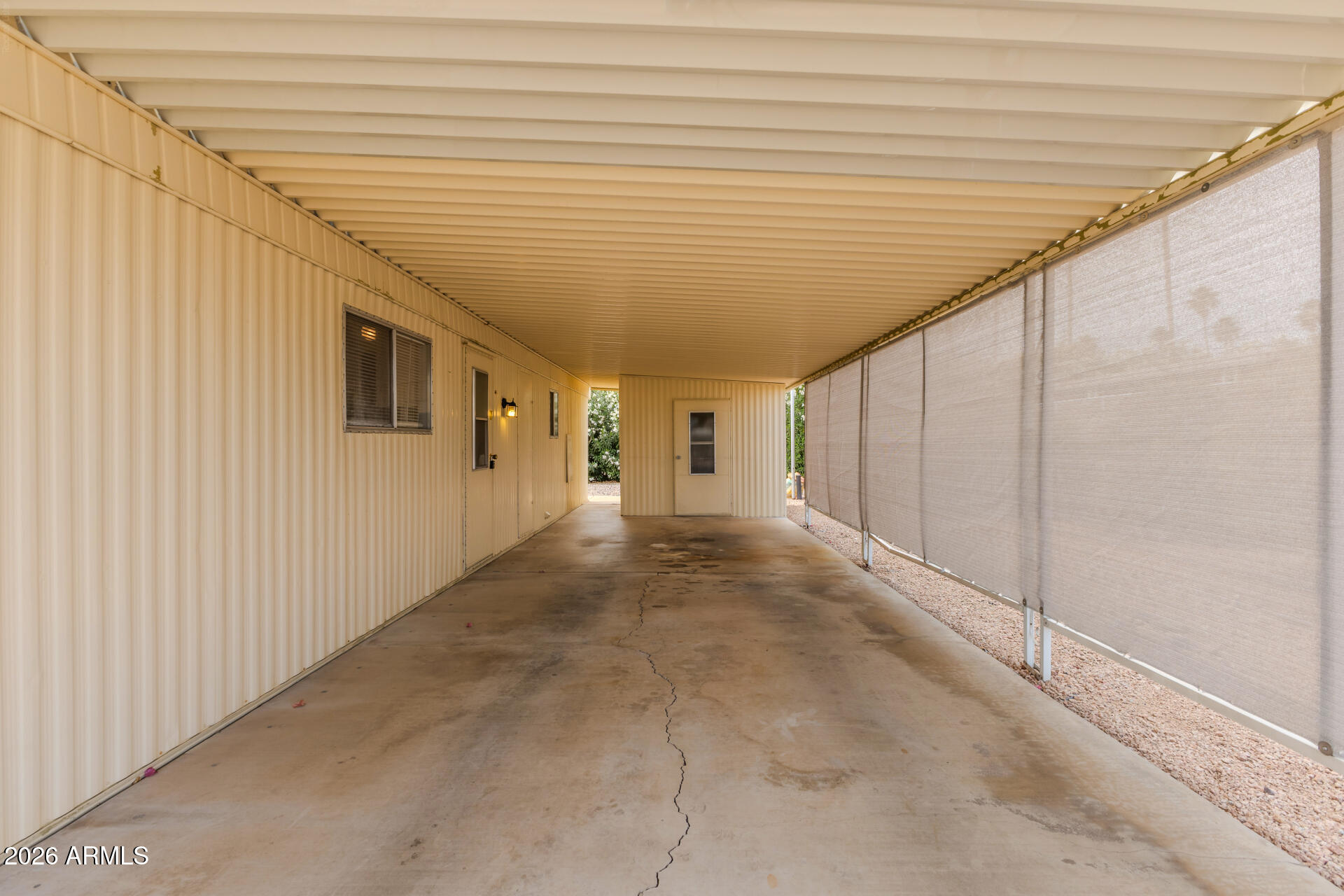3104 East Broadway Road, Unit 76 Mesa, AZ 85204 - Photo 22 of 26 a view of a back yard of the house