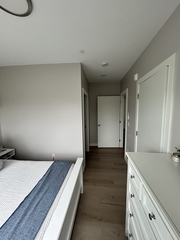 400 West Broadway, Unit 505 Boston, MA 02127 - Photo 15 of 18 a spacious bathroom with a granite countertop sink and a bathtub