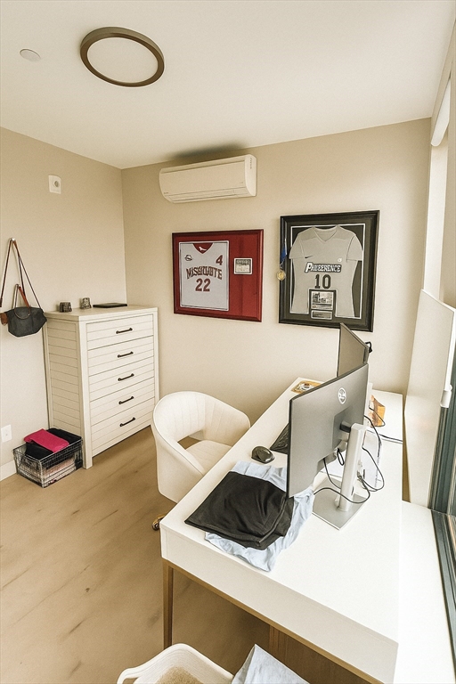 400 West Broadway, Unit 505 Boston, MA 02127 - Photo 6 of 18 a living room with furniture and a table