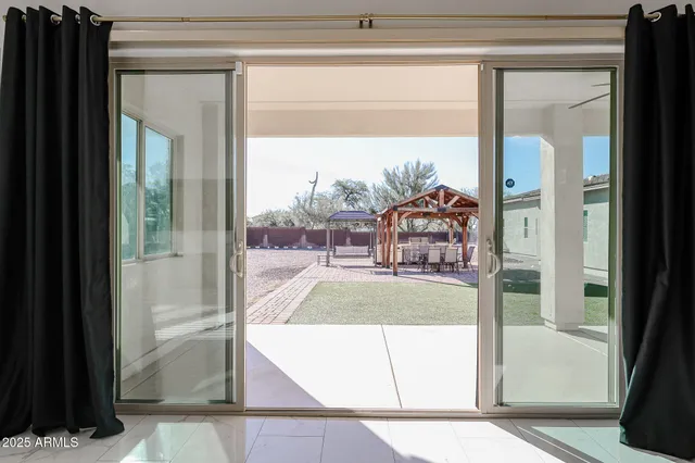 a view of a living room and a window