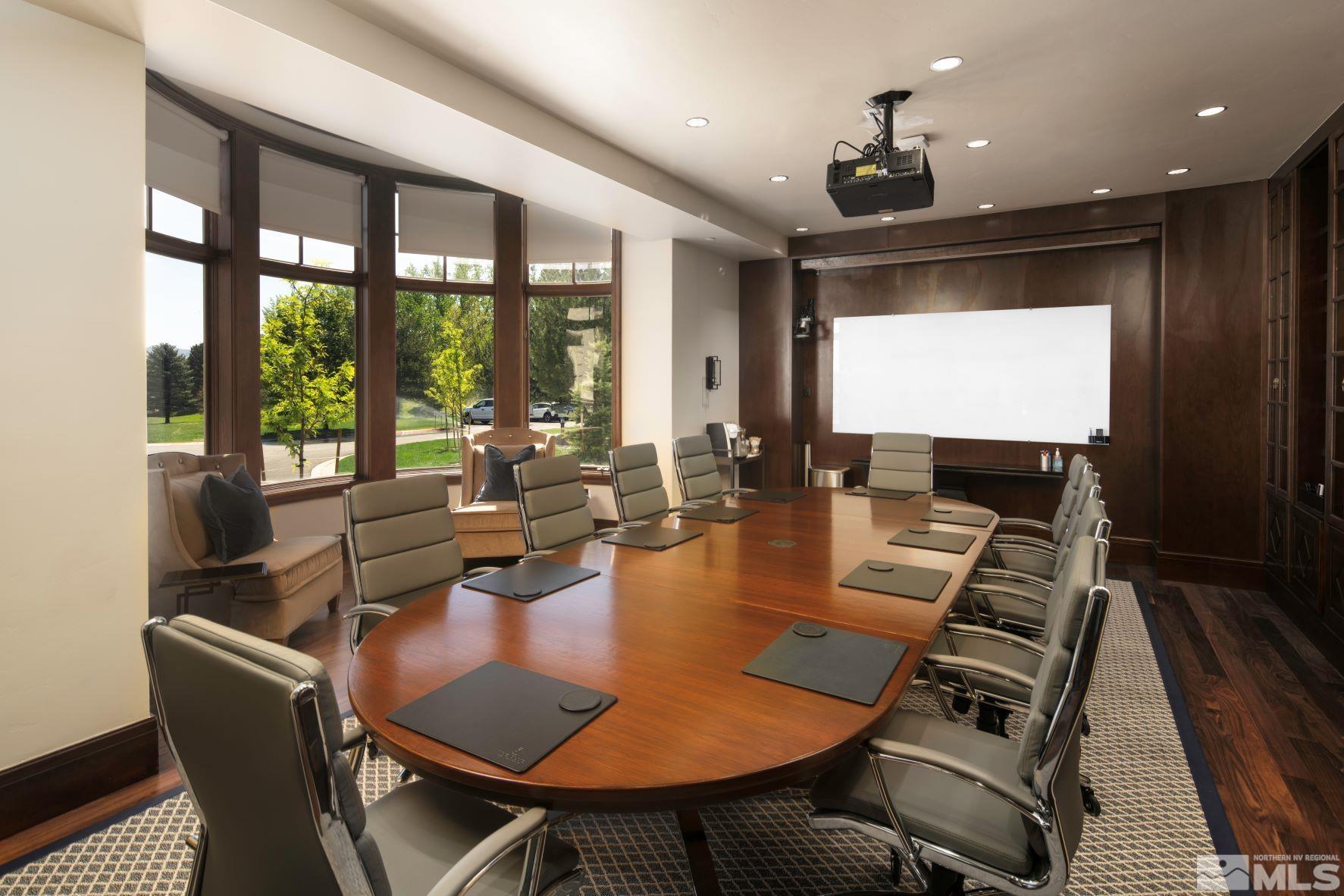 32 Campolina Street Reno, NV 89511 - Photo 20 of 31 a view of a dining room with furniture large windows and wooden floor