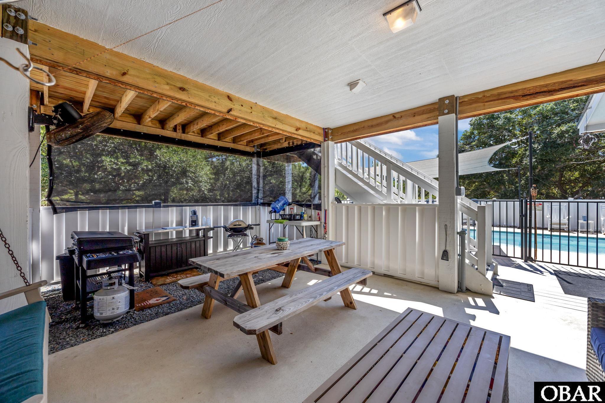 2364 Carova Road Corolla, NC 27927 - Photo 15 of 28 Covered Patio Downstairs