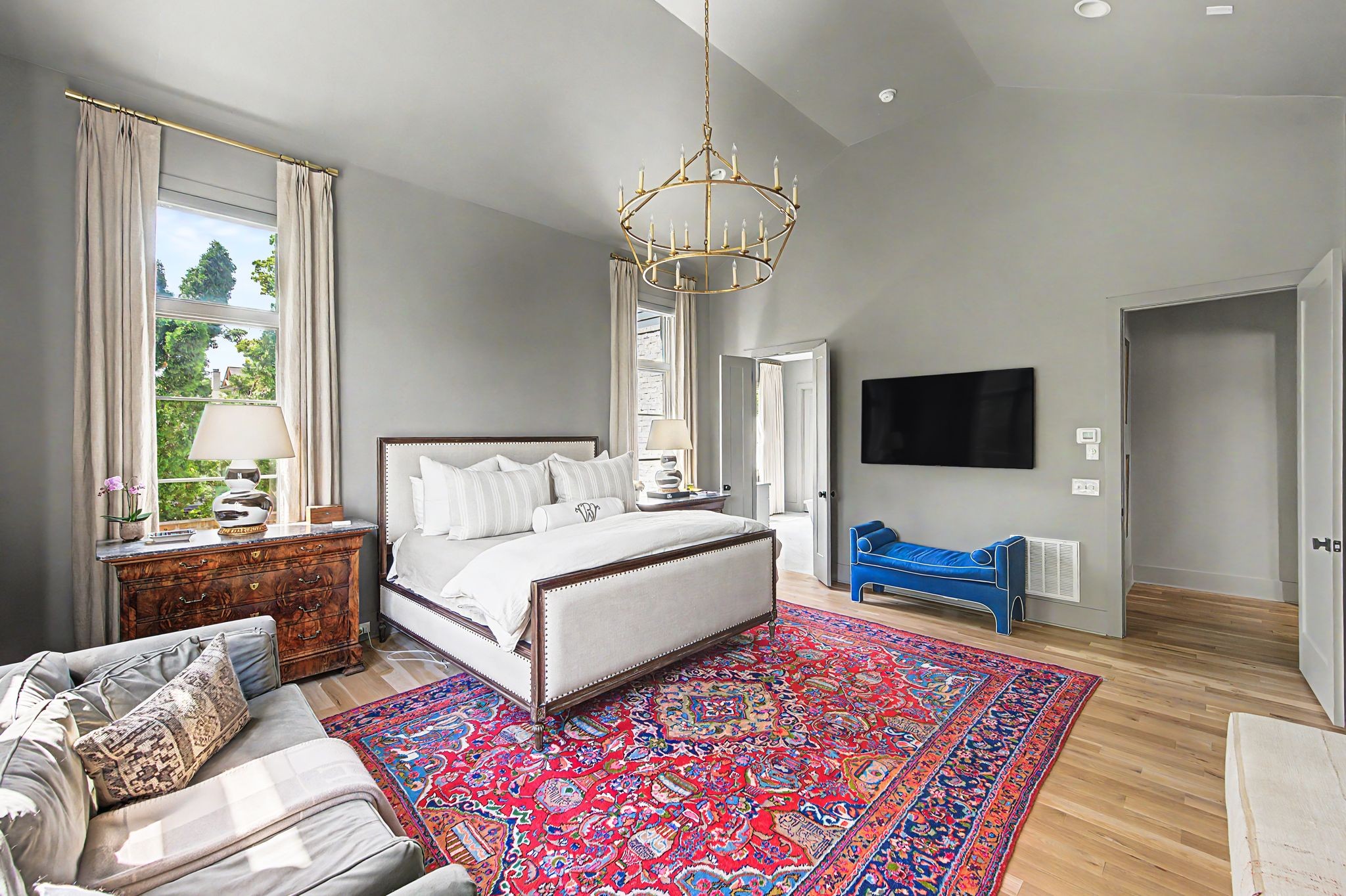 2825 Sugar Tree Road Nashville, TN 37215 - Photo 50 of 89 a spacious bedroom with a bed and a flat screen television