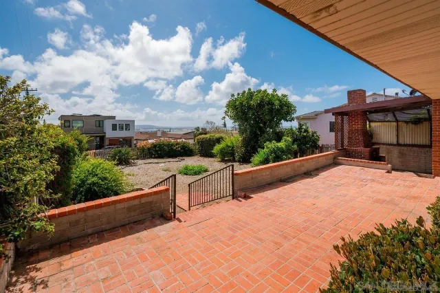 a view of balcony with furniture