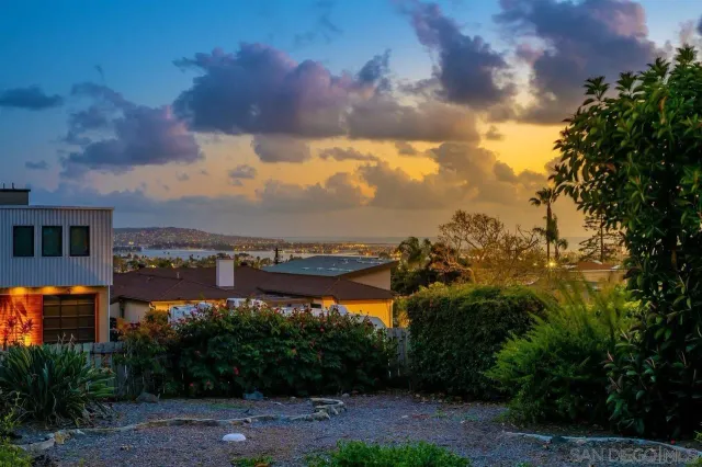 a view of a city with lots of trees