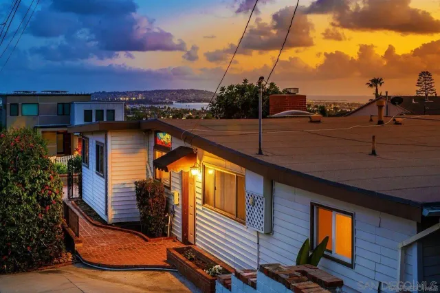 a view of a balcony with a potted plants