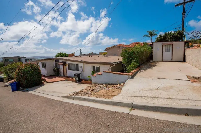 a view of a house with a patio